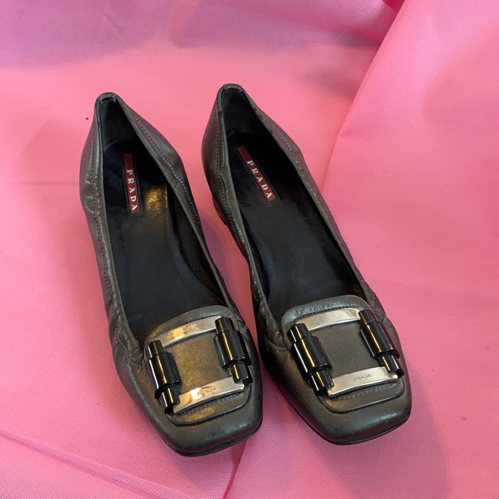 Prada black shoes with silver buckle